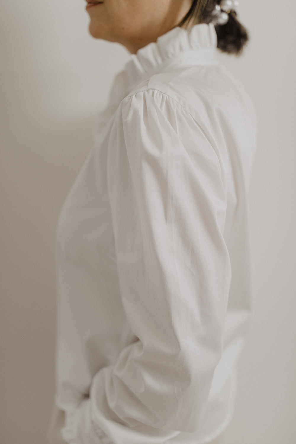 01.01.04 — The Ruffle Blouse / White