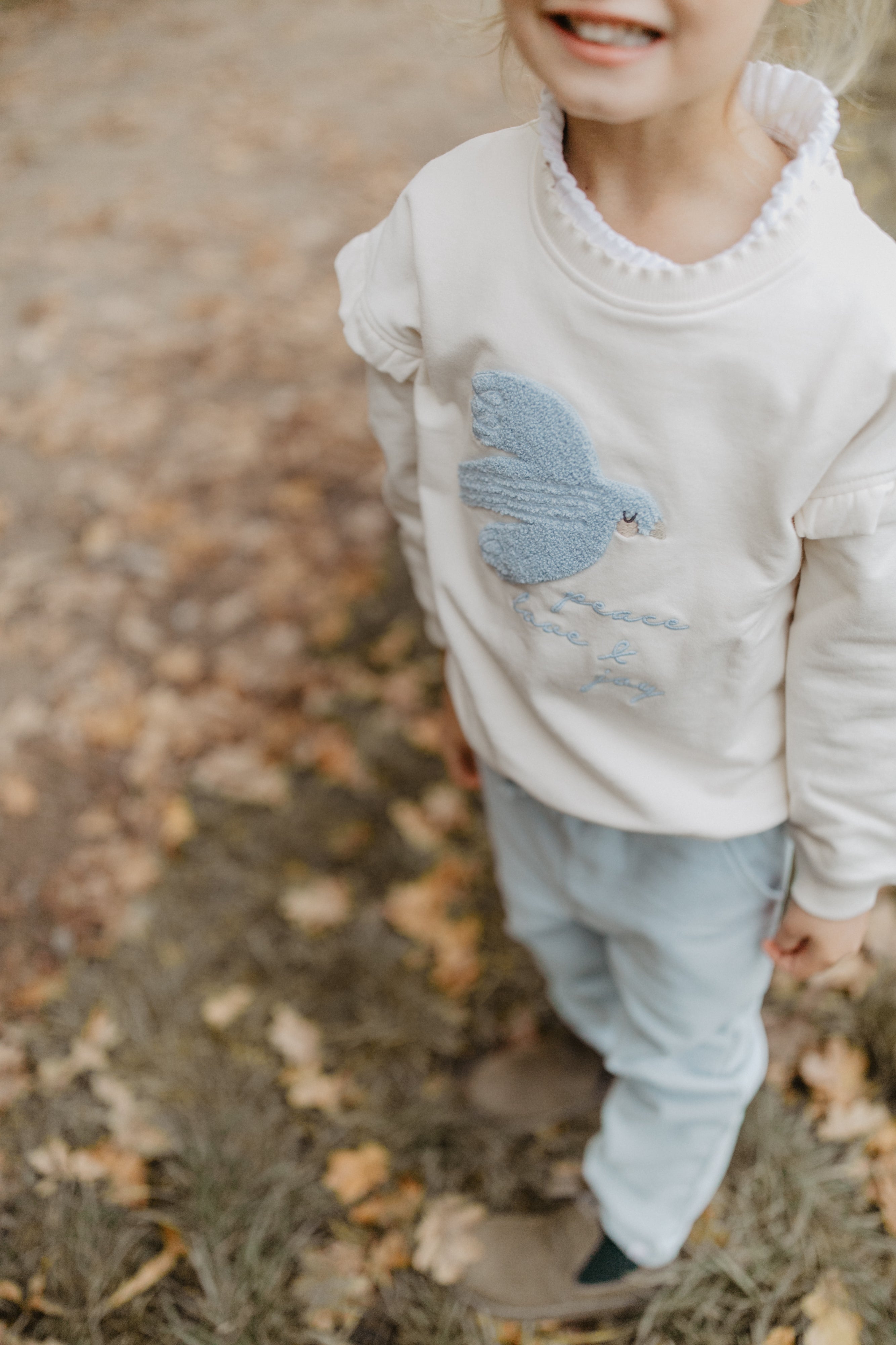 Oversized Sweatshirt 'peace, love & joy' mit Rüschendetails