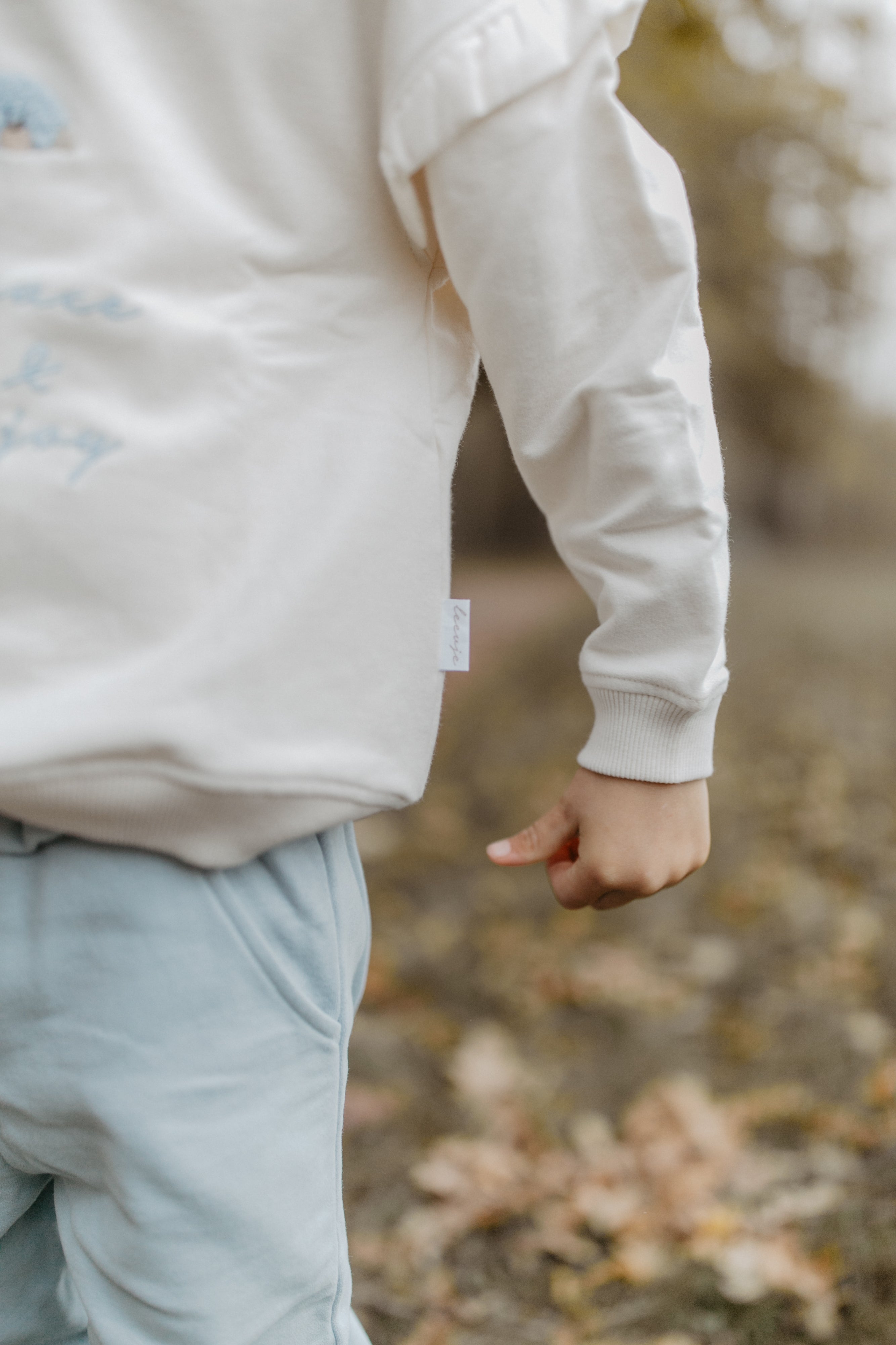 Oversized Sweatshirt 'peace, love & joy' mit Rüschendetails