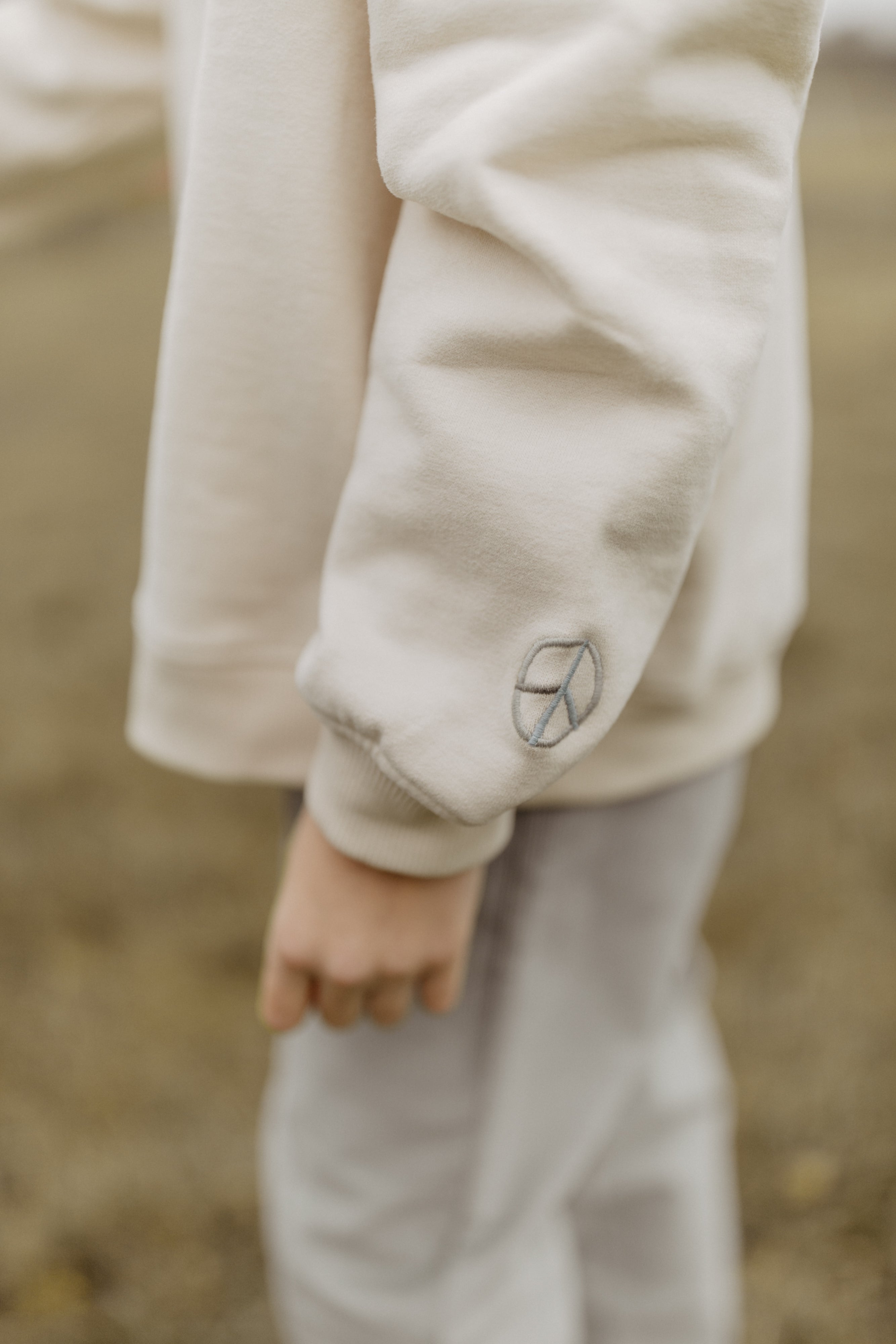 Unisex Oversized Sweatshirt 'peace begins with a smile'