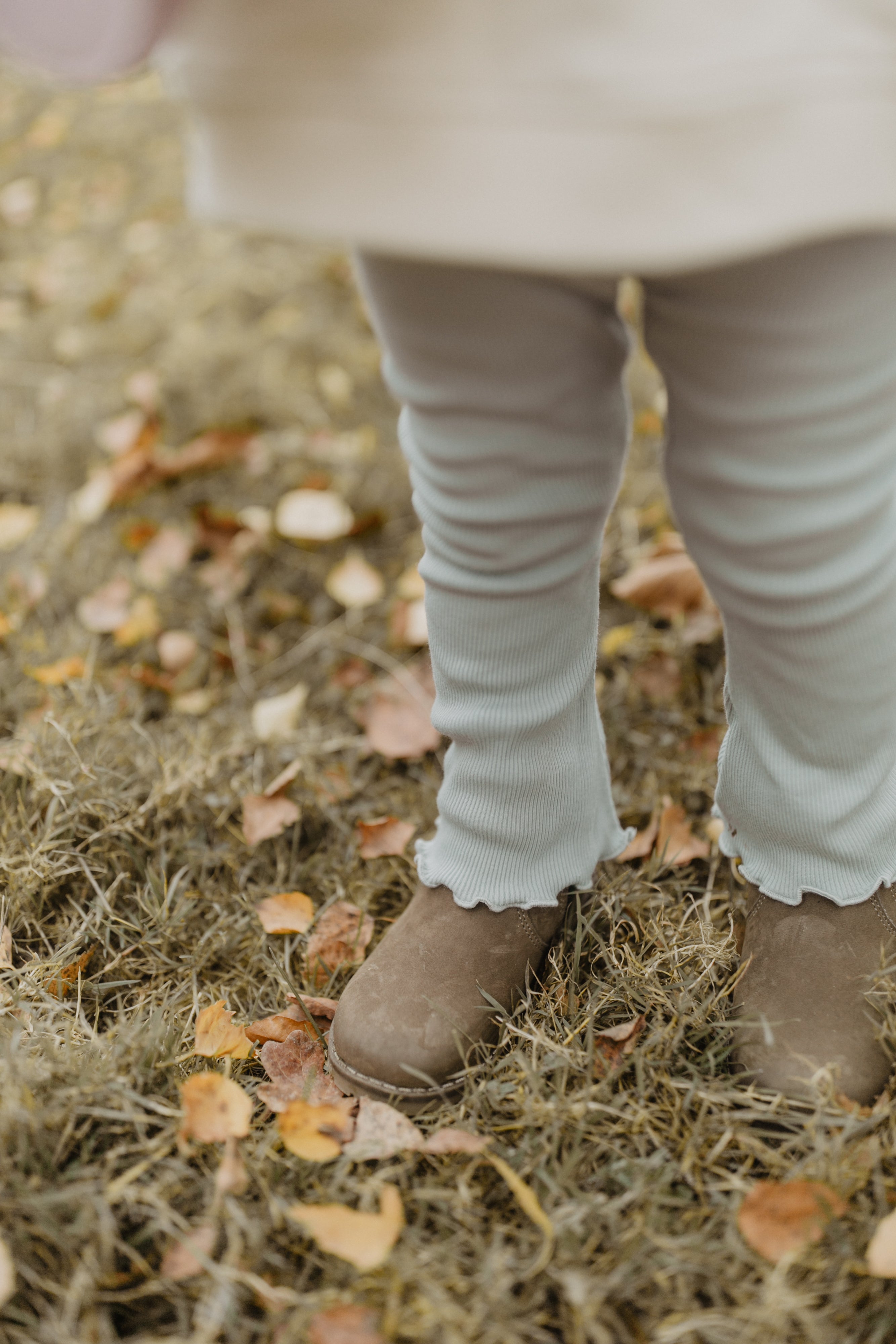 Schlag-Leggings 'soft green' mit Schleife aus Bio-Baumwolle