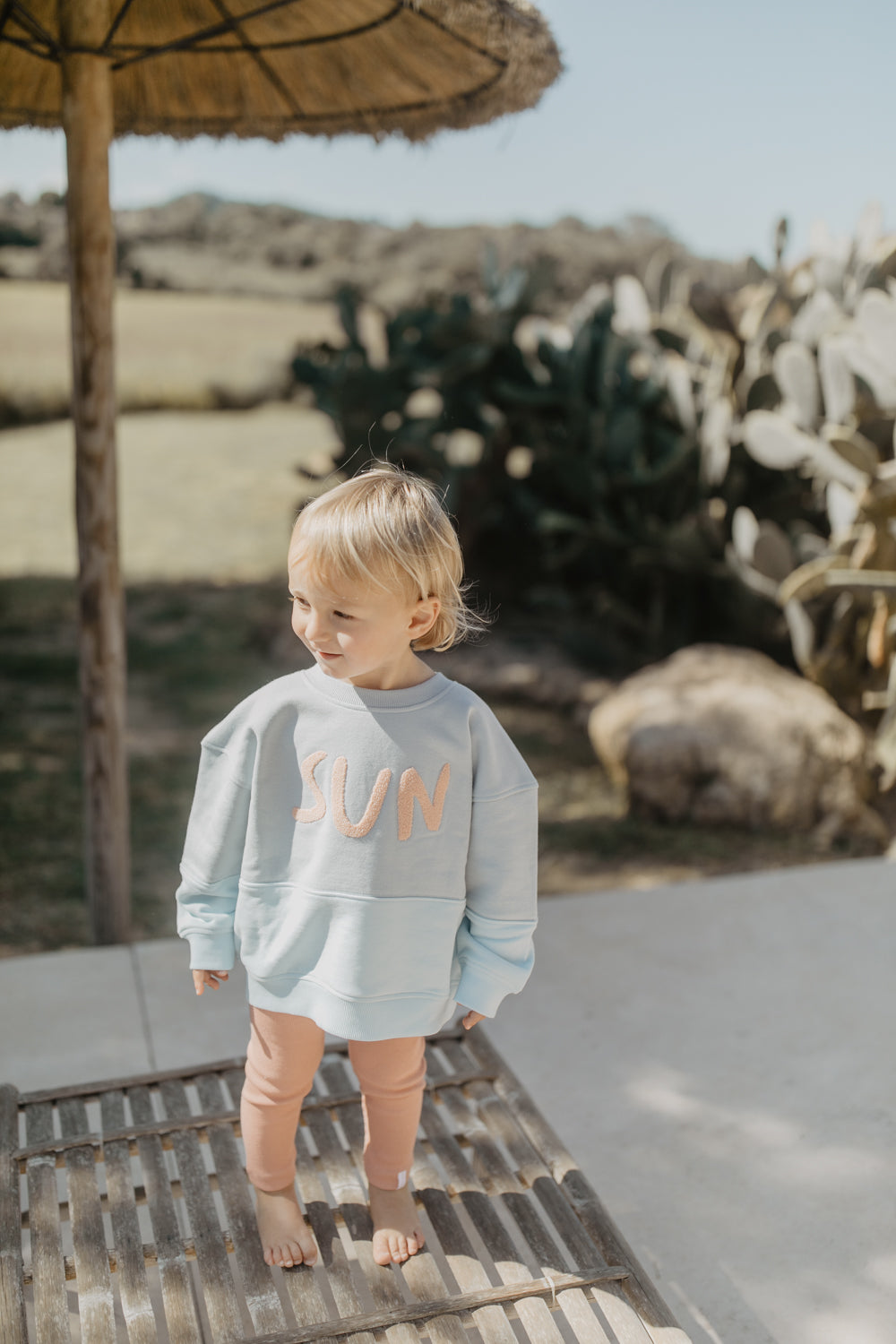 Unisex Oversized Sweatshirt ‘Sun’ in Clear Blue
