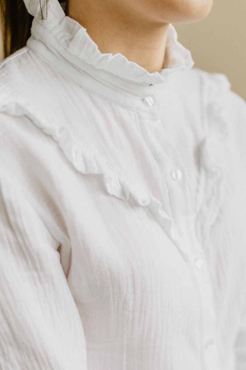 Muslin blouse with ruffles for women